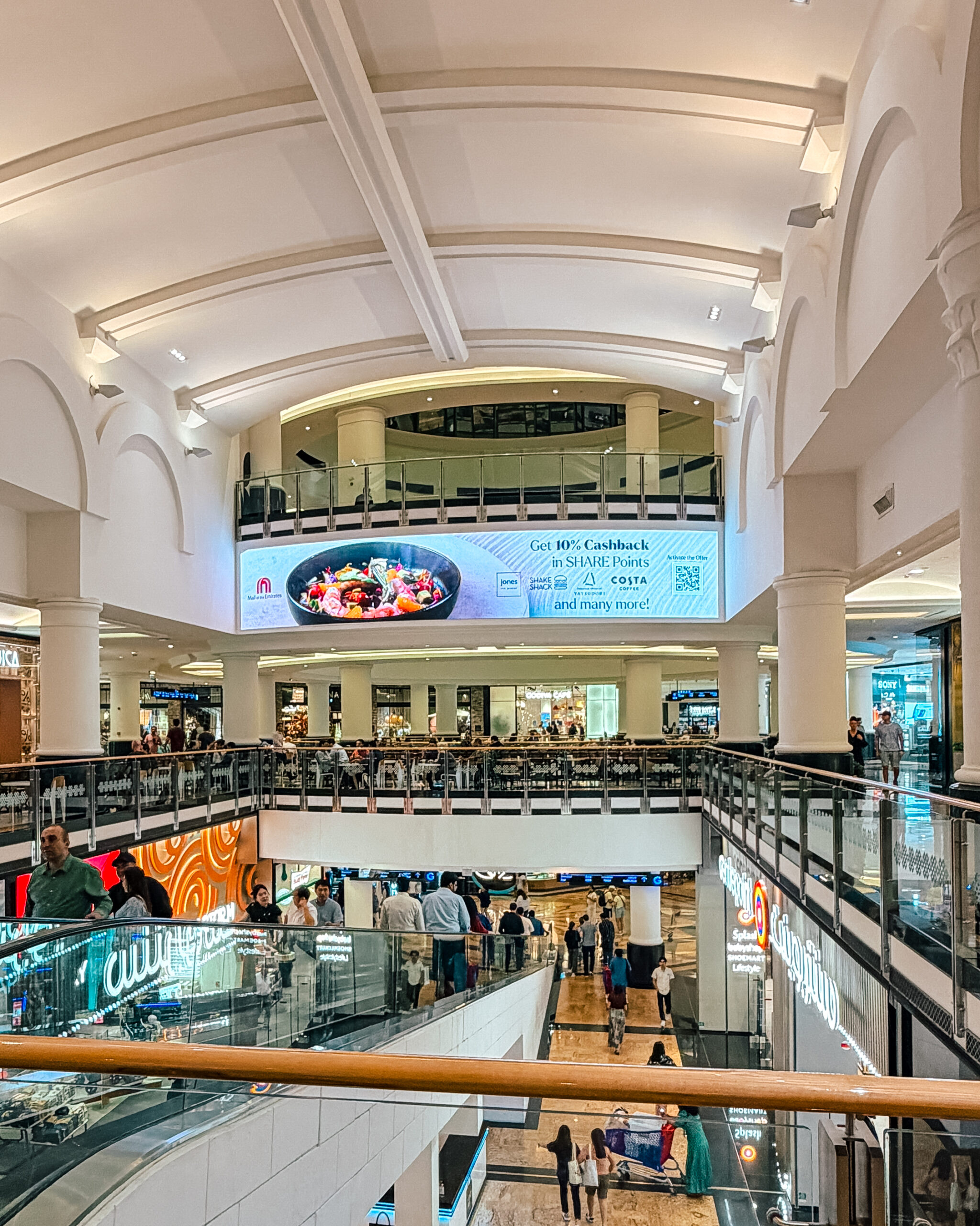 The SHARE Points cashback billboard on the balcony level of the vaulted Mall of the Emirates atrium.